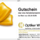 Einen Gutschein über eine Sehstärkenbestimmung im Wert von 25,00 EUR.
